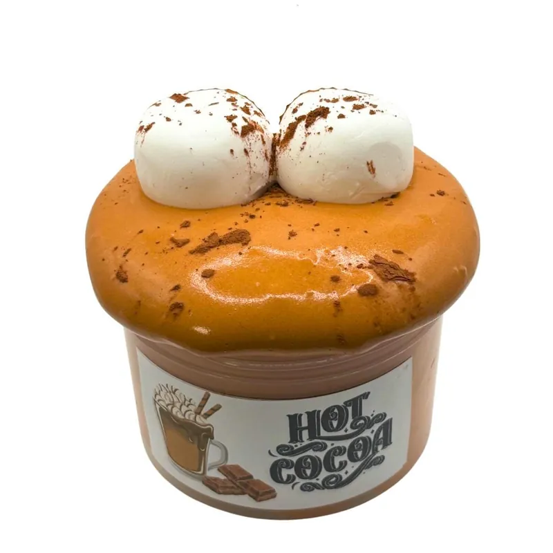 Brown glossy slime with marshmallow toppers on a white background