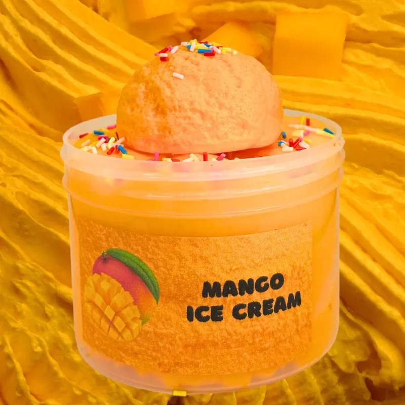 Mango Ice-Cream jar of orange cloud slime with a scoop topper and sprinkles