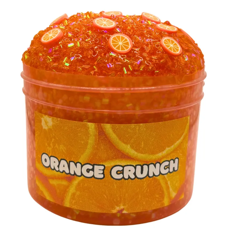 Orange Crunch jar of orange crunchy slime with orange slice charms