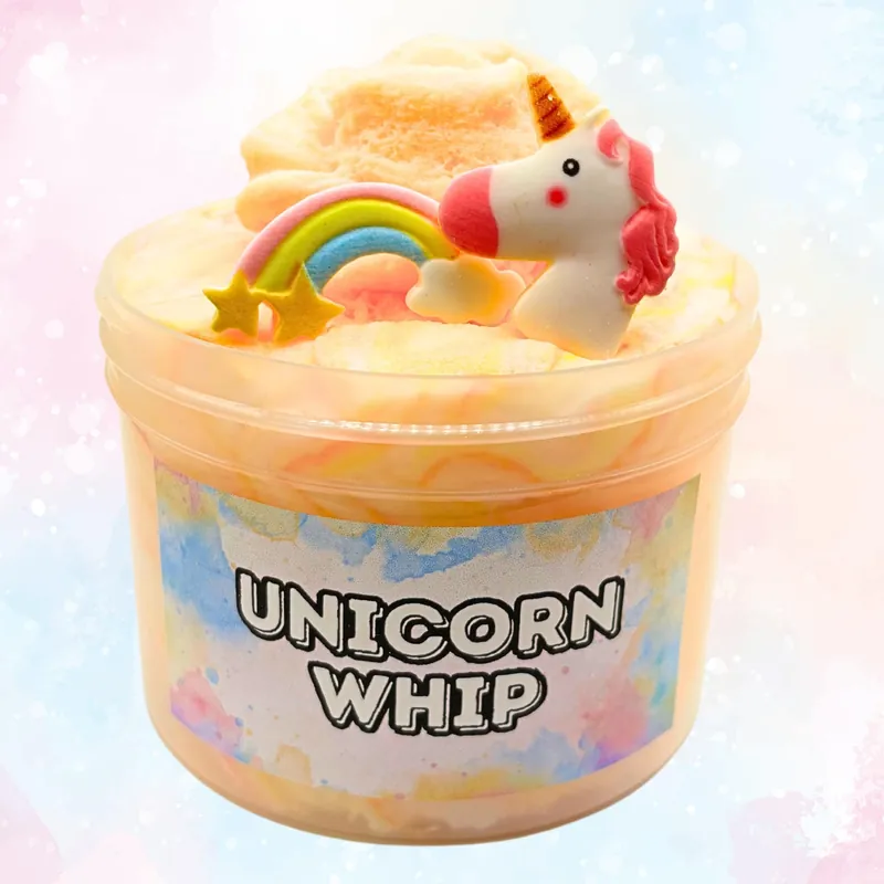 Unicorn Whip jar with peach cloud creme slime, a unicorn charm and a rainbow on top